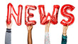 © Rawpixel.com - Red helium balloons forming the text news