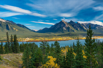 Wall Mural - Beautiful autumn colors by the lake and mountain range in Alberta, Canada