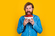 © be free - brutal bearded male man hold cherry berry, natural food