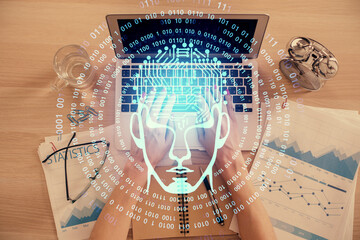 Double exposure of woman working on computer andhuman brain hologram drawing. Top View. Ai concept.