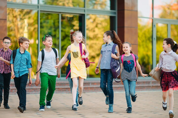 Wall Mural - Group of kids going to school together.