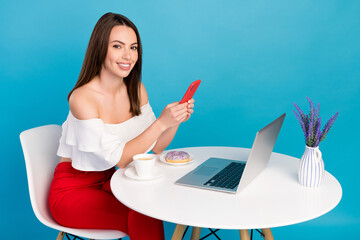 Sticker - Photo of cute shiny young woman dressed white blouse smiling sitting cafe typing modern gadget isolated blue color background