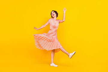 Poster - Profile photo of dreamy inspired girl dance look empty space wear striped dress isolated yellow color background