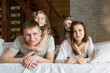 © aaalll3110 - morning family: the children with parents playing in bed. waking up from a dream. I just woke up. love