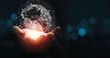 © Dilok - Hand holding virtual world with copy space and blue bokeh background for technology information and transformation concept.