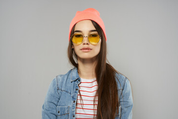 Wall Mural - woman in denim jacket wearing glasses studio home fashion