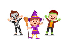 Cute Little Boy And Girl Celebrate Halloween With Friend