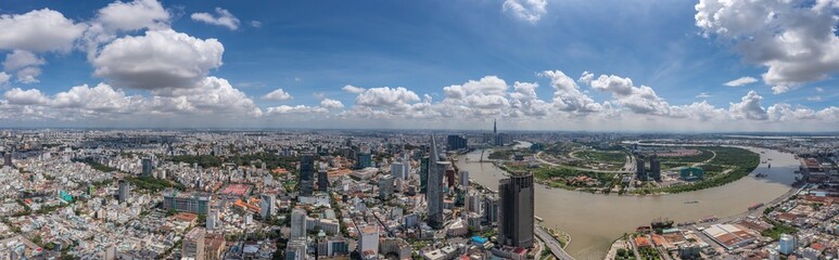 Wall Mural - Panoramic photo of Ho Chi Minh city and Saigon river in the cloudy day