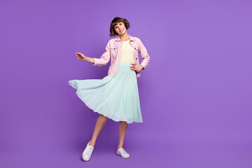 Wall Mural - Full body photo of young happy nice charming woman good mood wear fly skirt isolated on violet color background