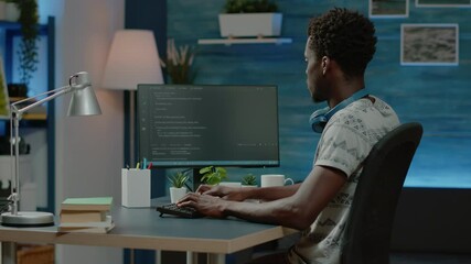Programmer using binary code for website interface development on computer. Person coding system for cybersecurity with firewall data. Coder programming security for software app