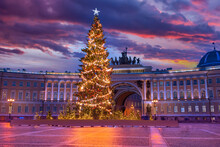Saint Petersburg Winter. Russia Christmas. Arc De Triomphe Sunset. Palace Square In Winter Evening. Christmas Tree In Front Of Arc De Triomphe. Christmas Tree With Glowing Garlands. Russia Holidays