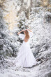 © Оля Ищенко - girl in a white dress in a snowy forest  snow-covered trees