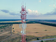 Telephone tower with 5g base station antenna on cell site. Aerial view of telecommunication mast