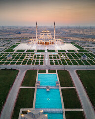 Wall Mural - The Sharjah Mosque in the Emirate of Sharjah, the United Arab Emirates aerial view