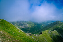 Scenic View Of Green Mountains Against Sky. Swirral Edge Descent From Helvellyn Peak