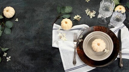 Poster - Harvest table setting on dark background.