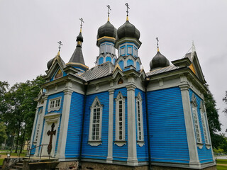 Sticker - Beautiful view of a blue orthodox church in Lithuania against a cloudy sky