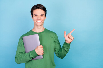 Canvas Print - Photo portrait young guy keeping laptop showing copyspace smiling isolated pastel blue color background