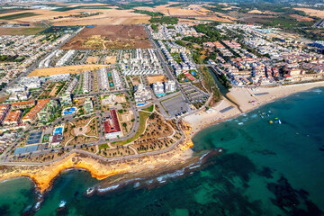 Wall Mural - Playa Mil Palmeras drone point of view. Aerial photography sandy beach and Mediterranean Sea at sunny summer day. Travel destinations and tourism concept. Spain, Costa Blanca, Alicante Province. Spain