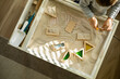 Cute toddler playing self development home kinetic sandbox use Maria Montessori method