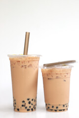 Sticker - Two cups Ice milk tea with boba bubble big and small cup on white background