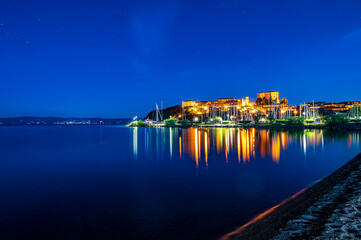 Wall Mural - Nightview of the village of Capodimonte on the Bolsena Lake