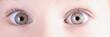 Little girl eyes with slight squint closeup