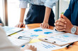 © PaeGAG - Business team meeting to conference, collaboration discussing working analyzing with financial data and marketing business strategy project, presentation and brainstorming to making profit of company