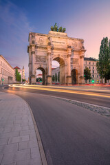 Wall Mural - Munich, Germany. Cityscape image of Munich, Bavaria, Germany with the Siegestor at summer sunset.