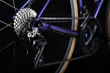 Detail of bicycle components. Close up cassette, chain and rear derailleur