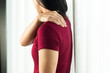 © PORNCHAI SODA - young women neck and shoulder pain injury, healthcare and medical concept