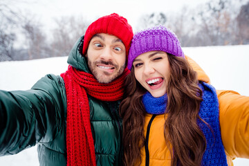 Poster - Photo of young excited girl guy happy positive smile make selfie fooling grimace have fun walk outdoors