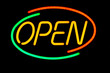 © Jean-Claude Caprara - Neon glowing open store sign