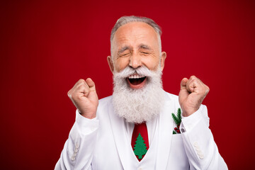 Sticker - Photo of funny aged white beard man hands fists yell wear white jacket isolated on red color background