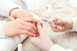 © 5second - Manicurist making manicure for client in salon