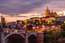 Cityscape Of Prague With The Famous Castle During Sunset.