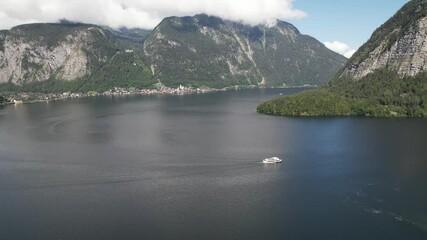 Wall Mural - Aerial view of Hallstätter See or Lake Hallstatt , tourist boat and mountains Alps next to village Hallstatt in Austria, travel and nature concept