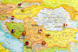 Close up view of Balkan peninsula on geographical globe, Map shows capitals countries Serbia - Belgrade, Bulgaria - Sofia, Romania - Bucharest, Montenegro - Podgorica. Albania - Tirana and their flags