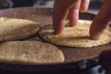 Process of cooking tacos with grilled flank beef steak with handmade guacamole