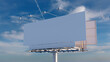 © RocknRoller Studios - Advertising Billboard. Blank Exterior Sign against a Cloudy Afternoon Sky. Mockup Template.