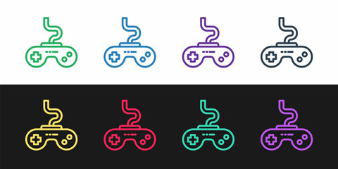 Set line Gamepad icon isolated on black and white background. Game controller. Vector