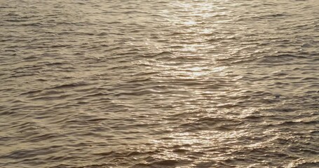 Poster - Sea water wave with sunset light