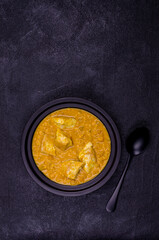 Wall Mural - Curry with vegetables, lentils and meat