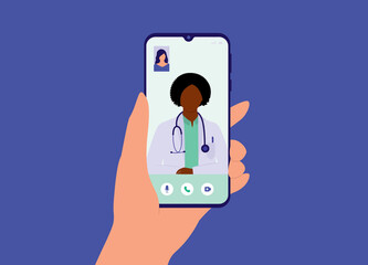 A Patient's Hand Holding Smartphone Making Video Call With Black Female Doctor. Telemedicine. Telehealth.