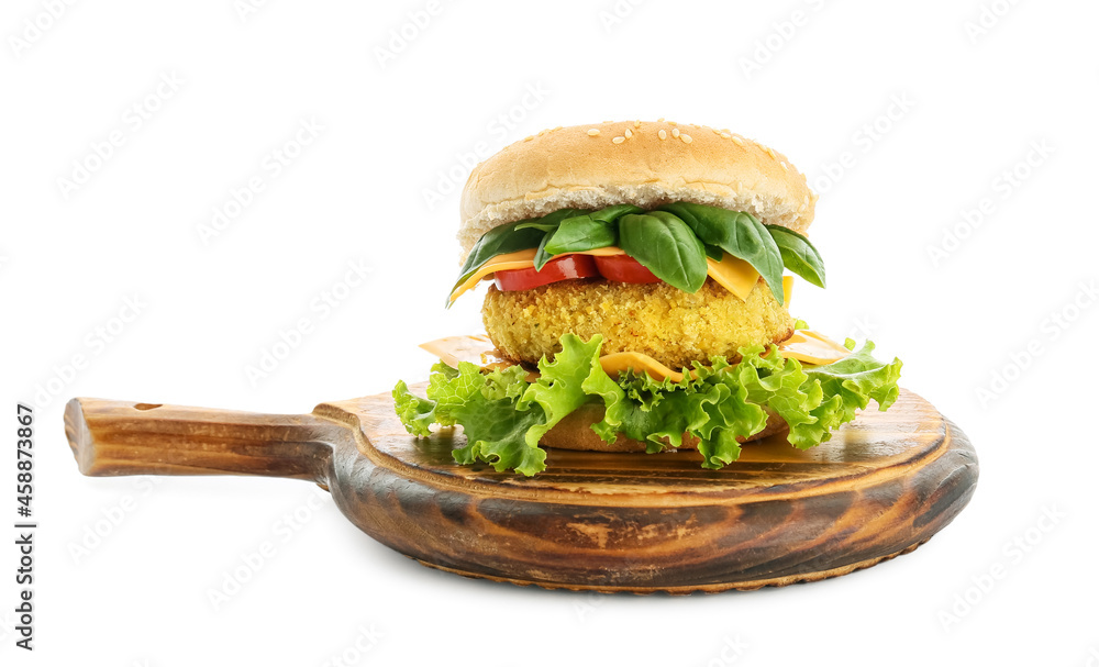 Wooden board with tasty vegetarian burger on white background