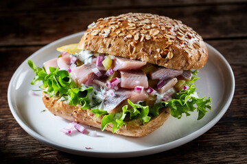 Wall Mural - Appetizing sandwich with fish on plate