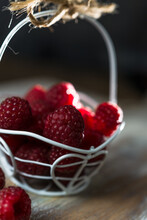 Fresh Organic Raspberries In A Tiny Vintage Metal Basket 