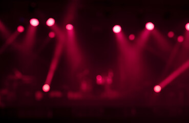 Blur image of red stage lights background.