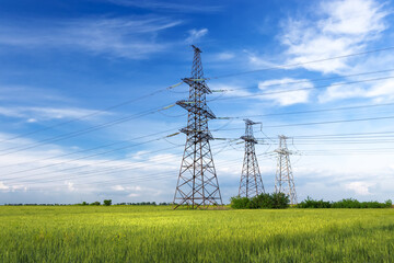 power line summer landscape / passing overhead electricity wire of the support carrying the light and the heat in the house