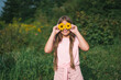 © Вера Щербакова - Cute girl with flowers eyes showing white teeth, in a summer outdoor. High quality photo